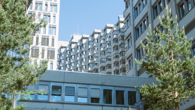 Modern multi storey buildings connected by a walkway