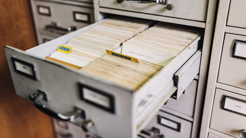 Open drawer of an index card filing cabinet