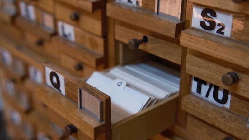 Wooden index drawers labelled with letters